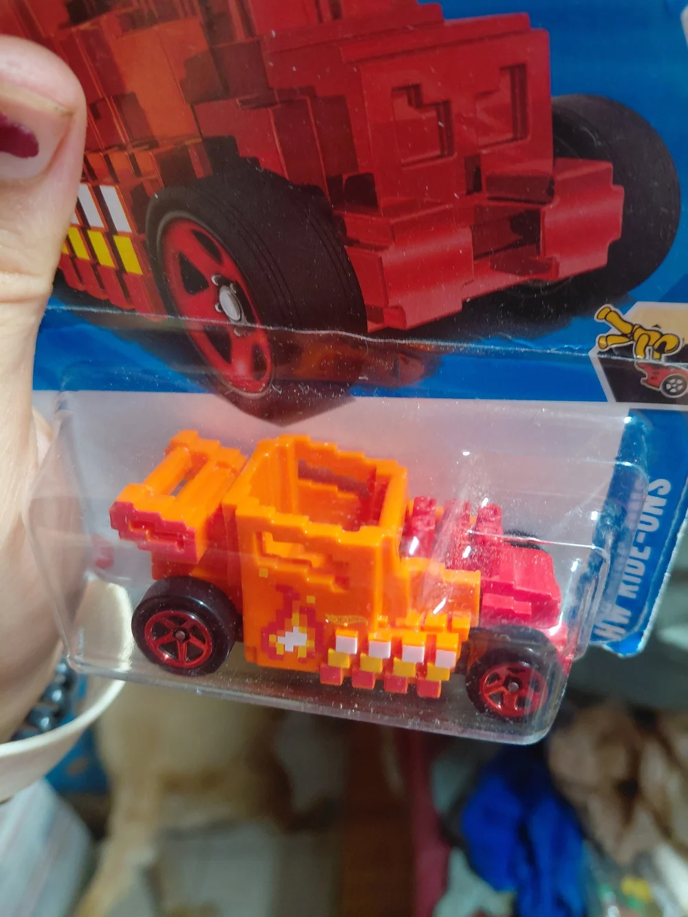 orange Hot Wheels Pixel Shaker diecast car (collector number 138/250, HW Ride-On